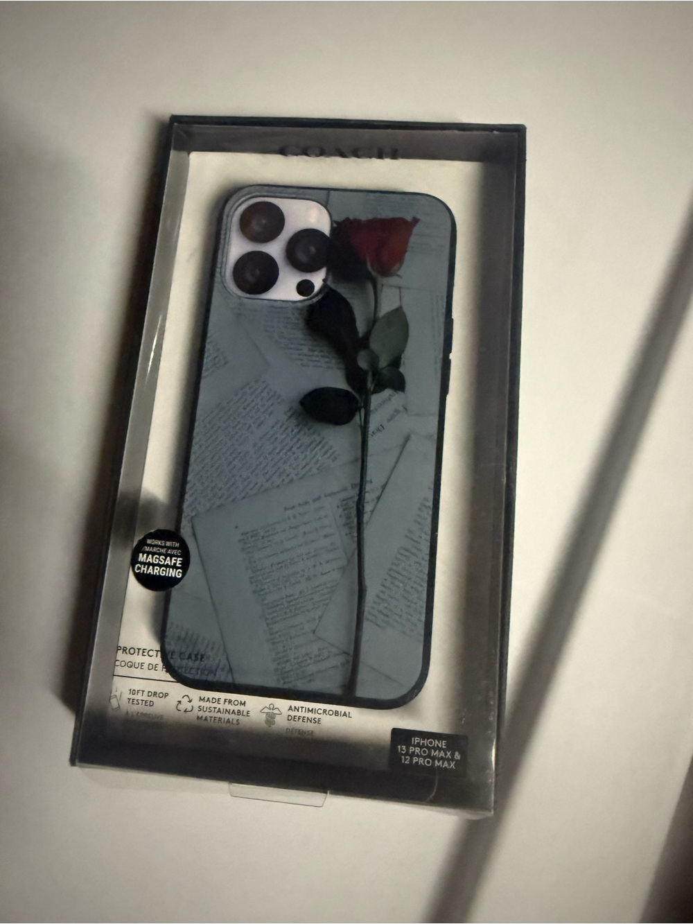 Coach iPhone Case with Red Rose on Black Background